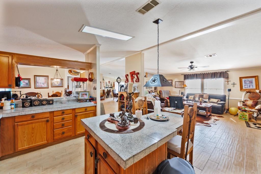 474 Hanging Tree Road Bowie, TX 76230 - Photo 5 of 27 a view of a dining room and livingroom view
