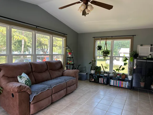 a white refrigerator freezer sitting next to a white wall