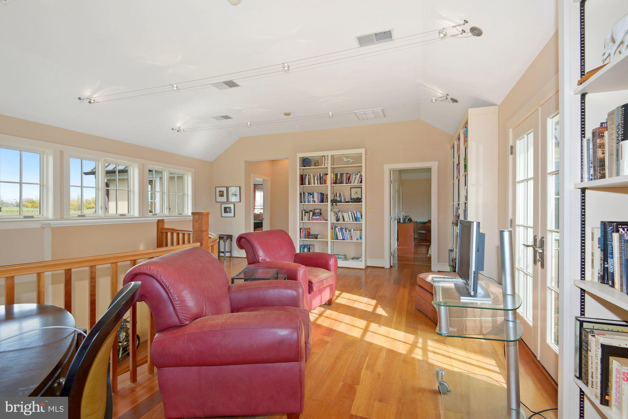 21232 Unison Road Middleburg, VA 20117 - Photo 43 of 123 2nd floor common area with built-in bookshelves