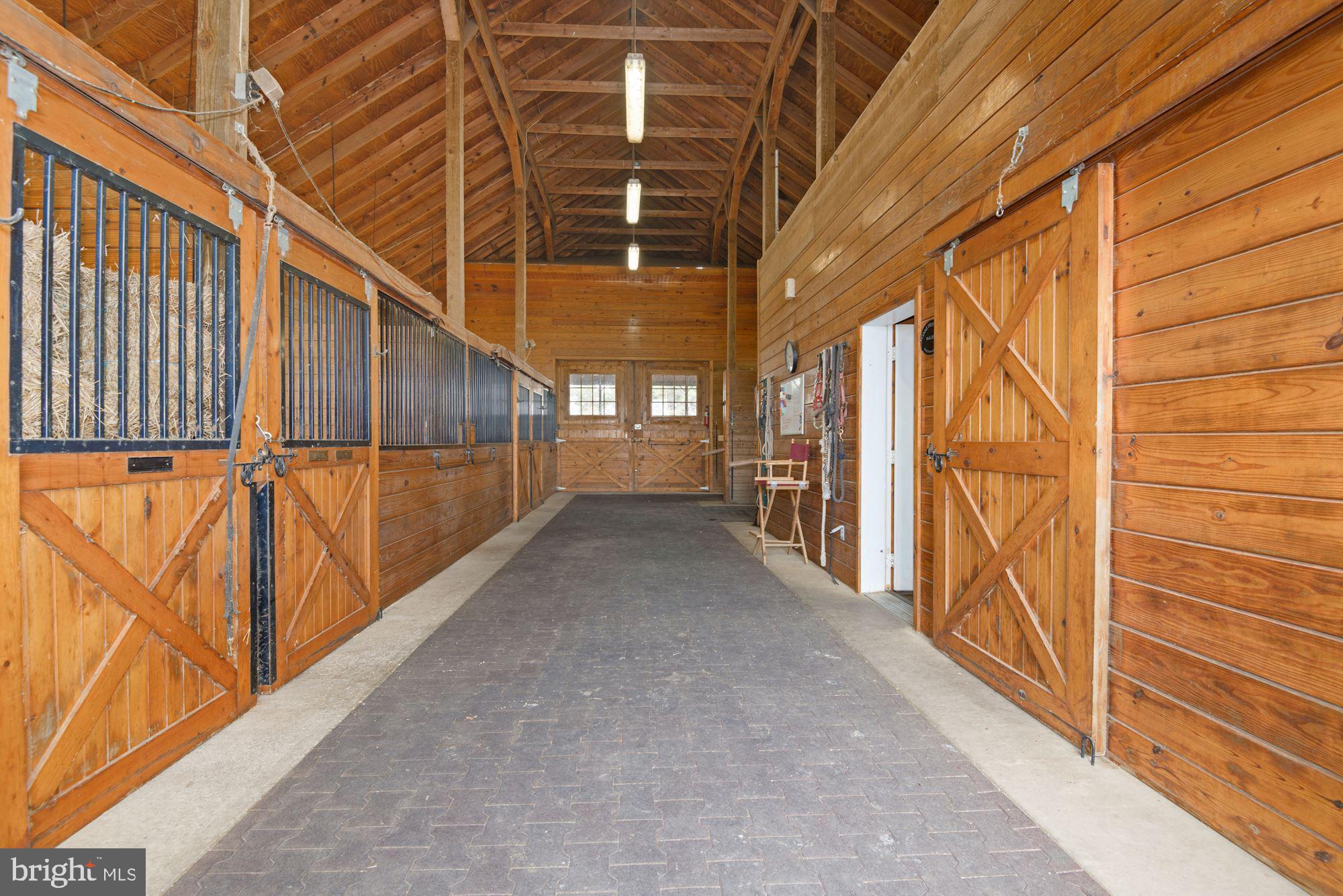 21232 Unison Road Middleburg, VA 20117 - Photo 56 of 123 Rubber tile pavers lead to 70x100 indoor