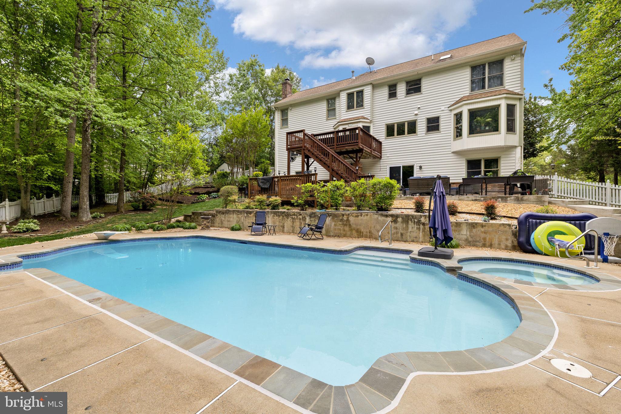 100 Boscobel Road Fredericksburg, VA 22405 - Photo 1 of 67 a view of a swimming pool with a patio