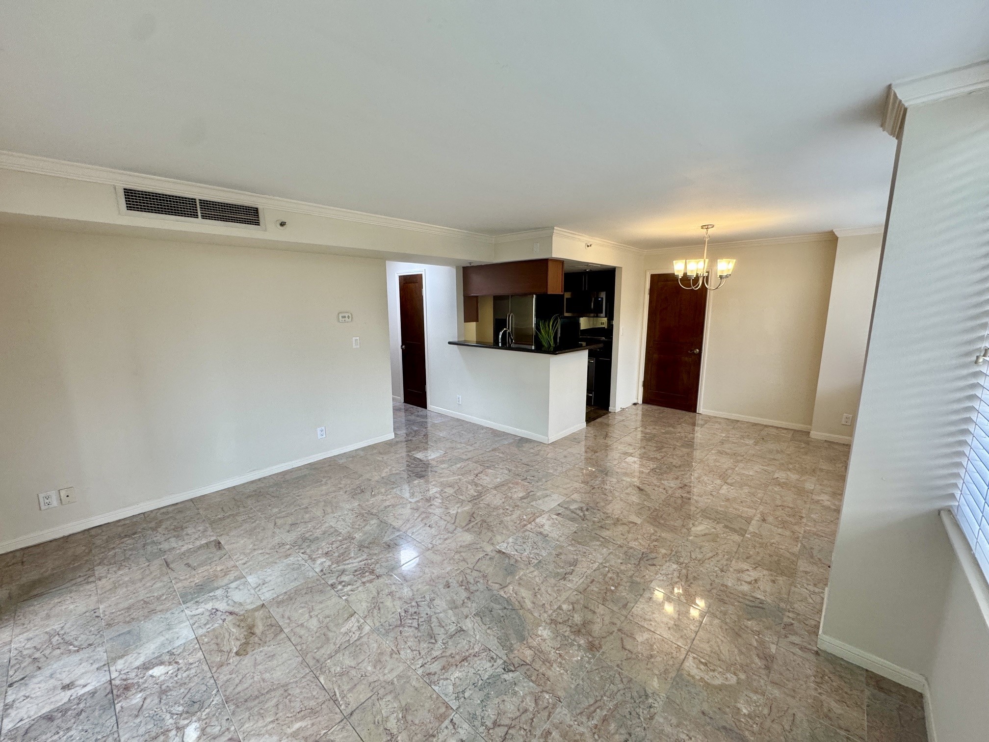 3525 Sage Road, Unit 404 Houston, TX 77056 - Photo 9 of 42 Taken from living area, the kitchen is adjacent to the dining area.