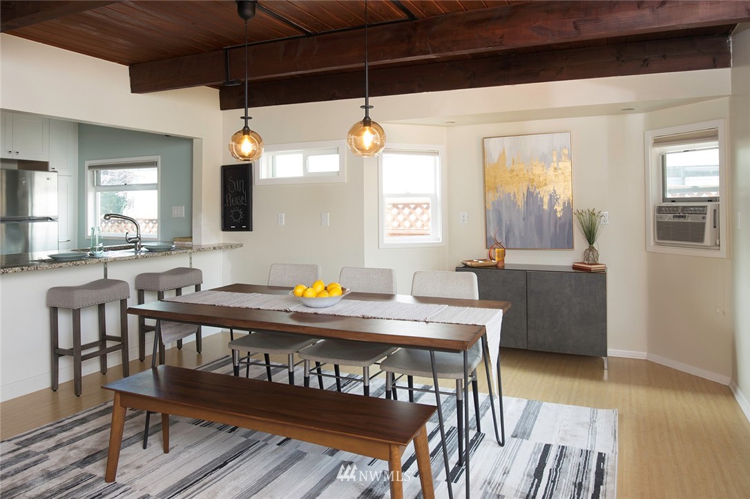 736 North 88th Street Seattle, WA 98103 - Photo 16 of 17 a view of a kitchen with a table and chairs