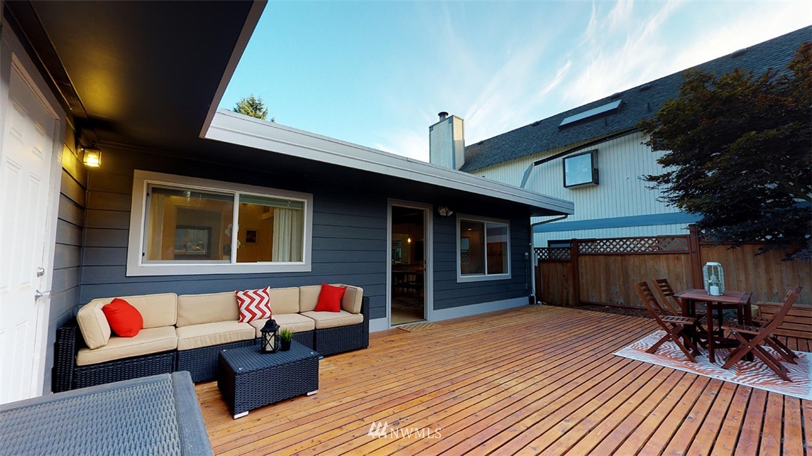 736 North 88th Street Seattle, WA 98103 - Photo 17 of 17 a front view of a house with dining table and chairs
