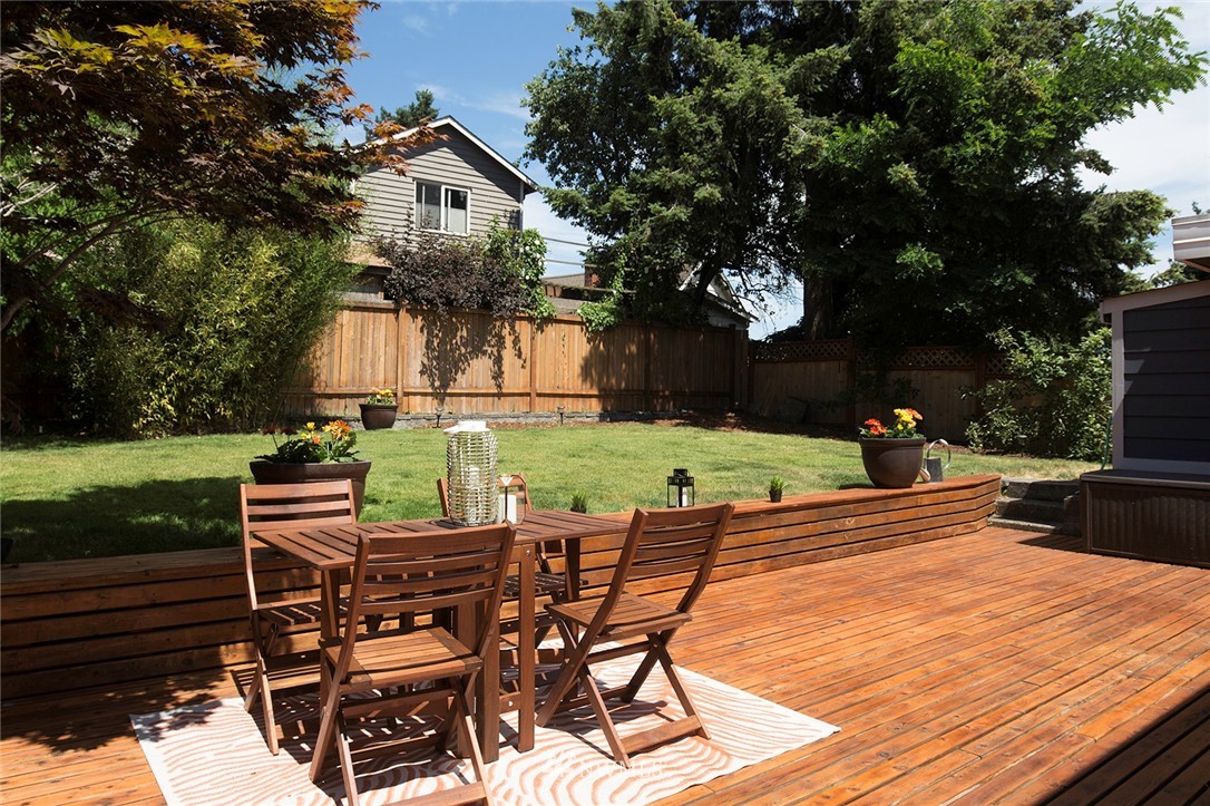 736 North 88th Street Seattle, WA 98103 - Photo 3 of 17 a view of a chairs and tables in the patio