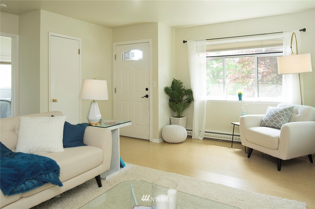 736 North 88th Street Seattle, WA 98103 - Photo 7 of 17 a living room with furniture and a large window