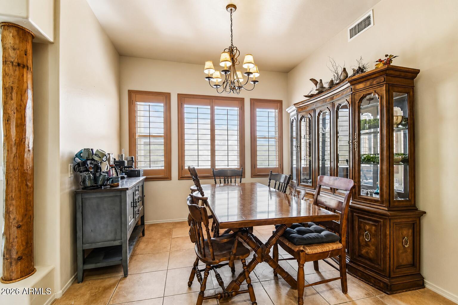 1547 North Val Vista Road Apache Junction, AZ 85119 - Photo 9 of 59 a dining room with furniture and window