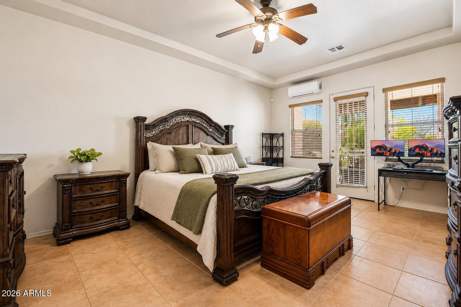 1547 North Val Vista Road Apache Junction, AZ 85119 - Photo 14 of 59 a bedroom with a bed and ceiling fan