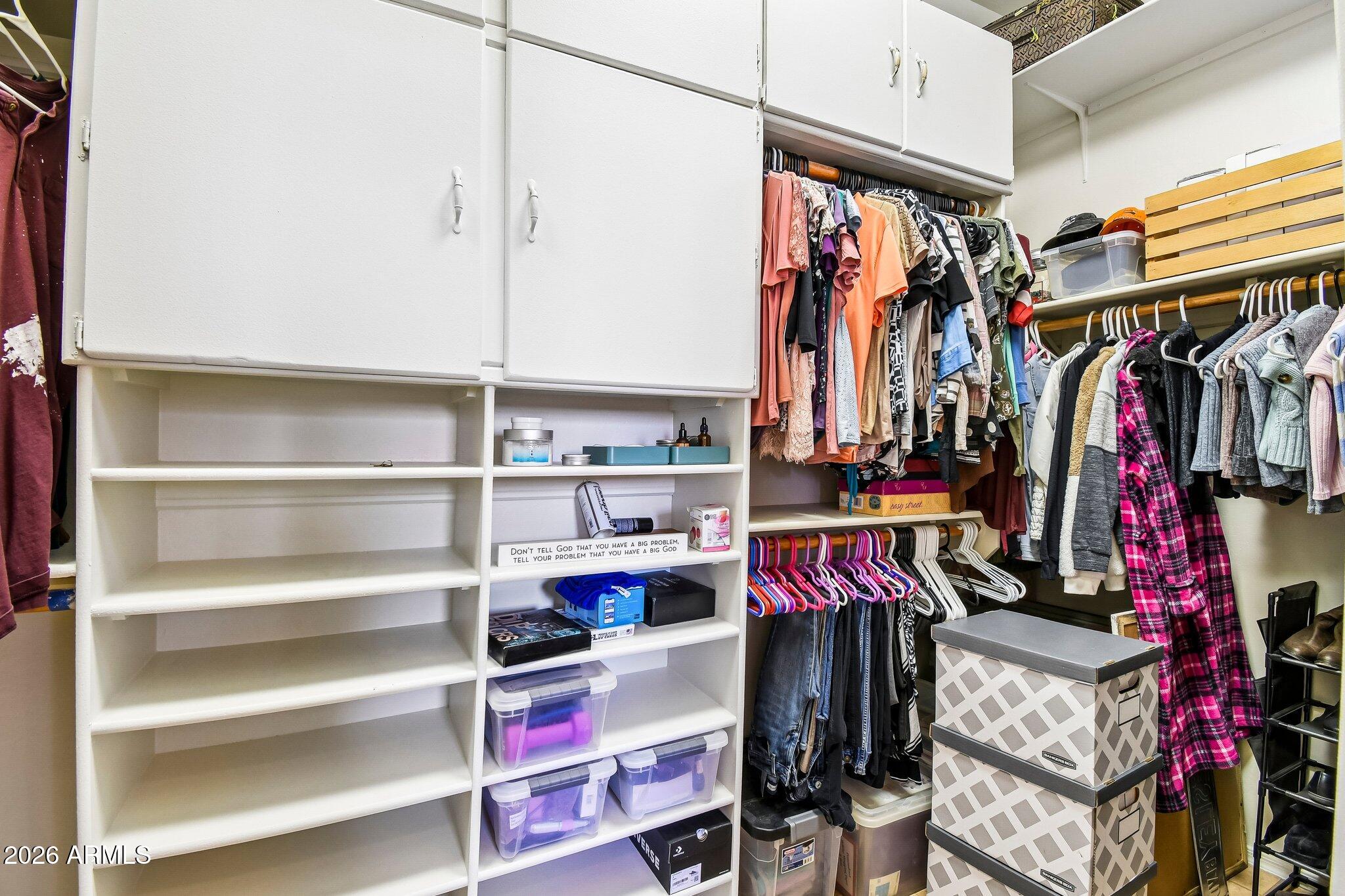 1547 North Val Vista Road Apache Junction, AZ 85119 - Photo 20 of 59 a view of walk in closet with clothes and shoes