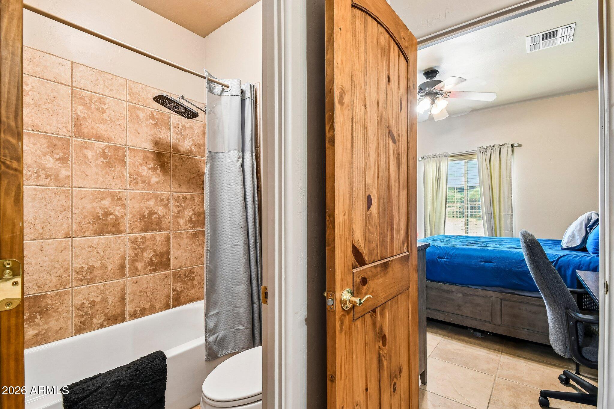 1547 North Val Vista Road Apache Junction, AZ 85119 - Photo 24 of 59 a bathroom with a tub and shower