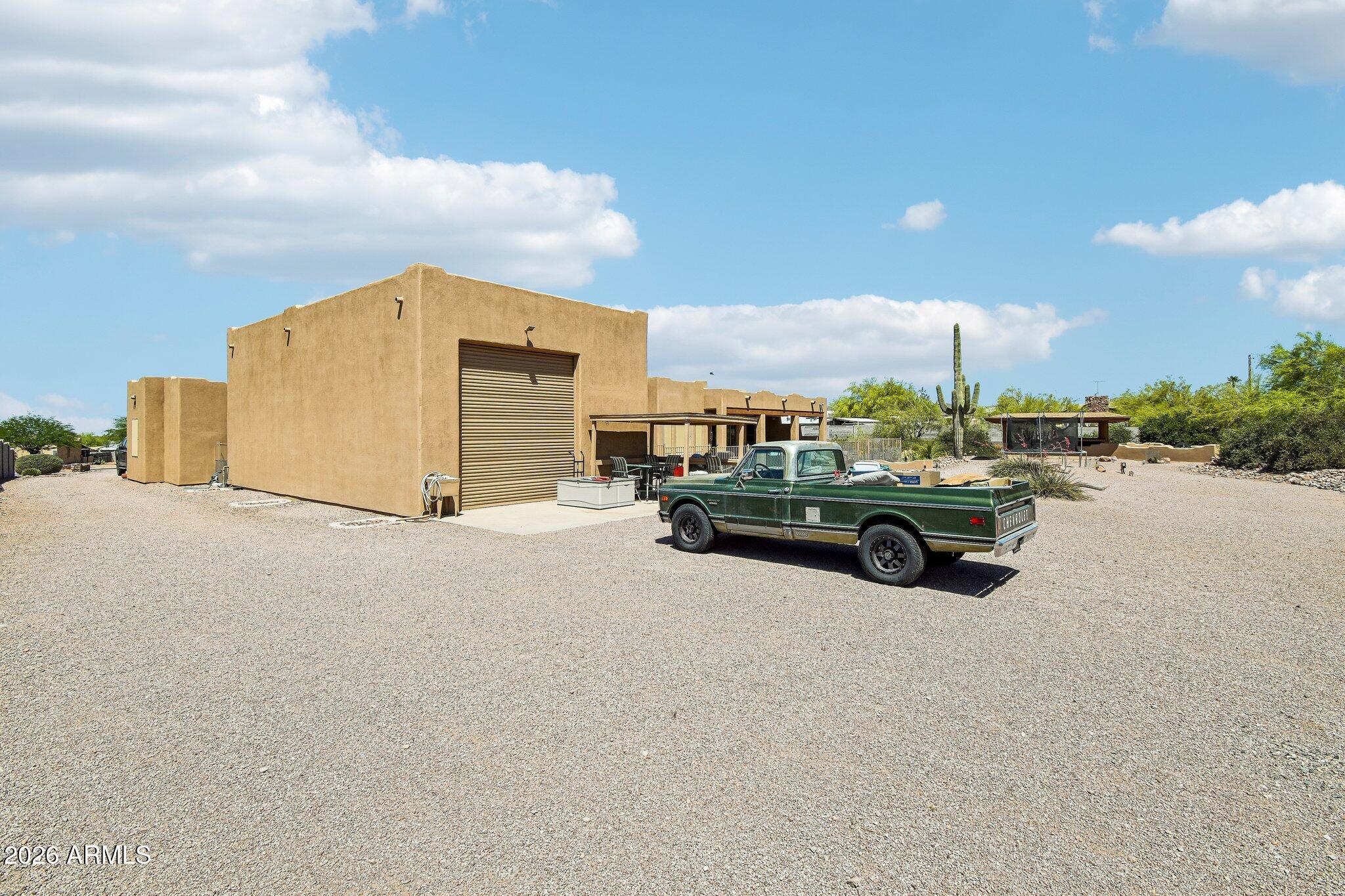 1547 North Val Vista Road Apache Junction, AZ 85119 - Photo 30 of 59 a view of a terrace with a barbeque
