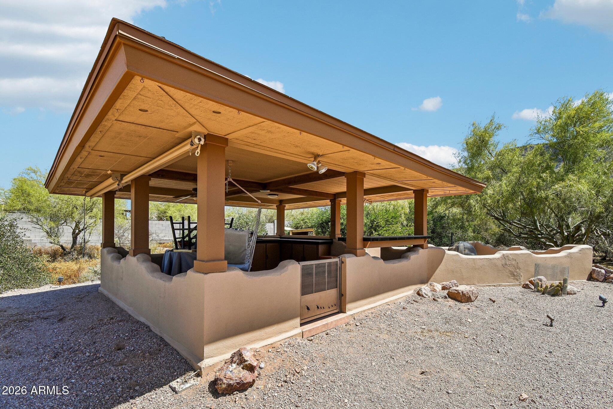 1547 North Val Vista Road Apache Junction, AZ 85119 - Photo 37 of 59 a view of outdoor space yard deck patio and swimming pool