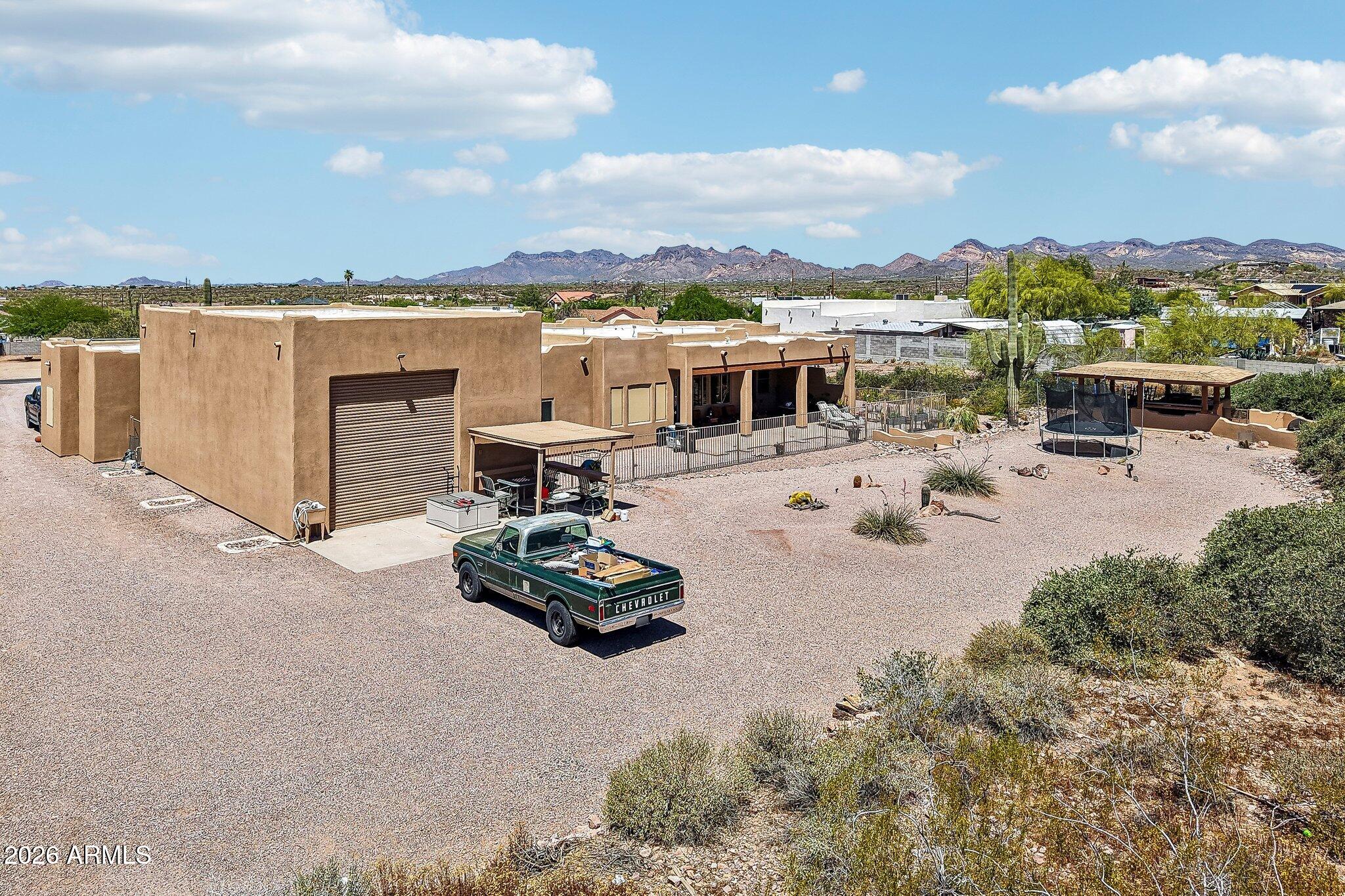 1547 North Val Vista Road Apache Junction, AZ 85119 - Photo 49 of 59 a view of a terrace with lawn chairs