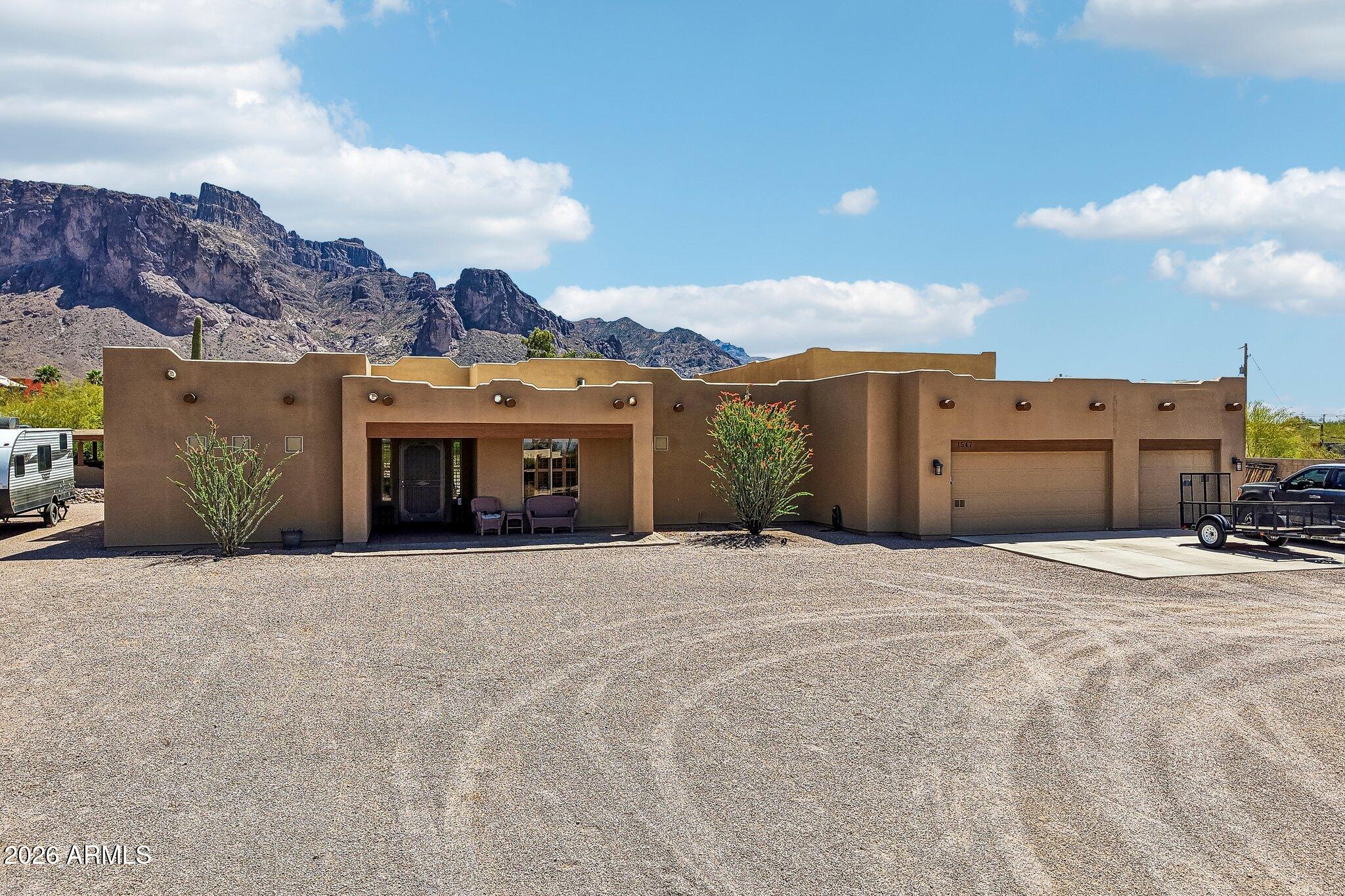 1547 North Val Vista Road Apache Junction, AZ 85119 - Photo 50 of 59 a large house with a large windows