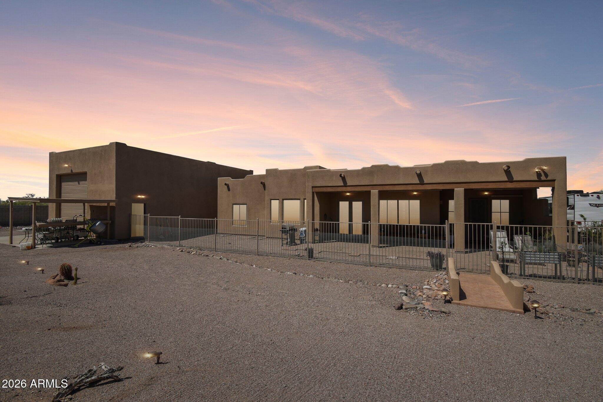 1547 North Val Vista Road Apache Junction, AZ 85119 - Photo 56 of 59 a view of a house with swimming pool and sitting area