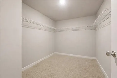 a view of a room with racks on the wall