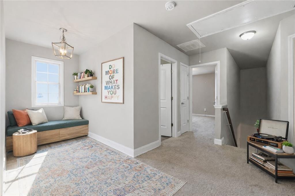 847 Wellford Avenue Jefferson, GA 30549 - Photo 22 of 33 a living room with furniture and a flat screen tv