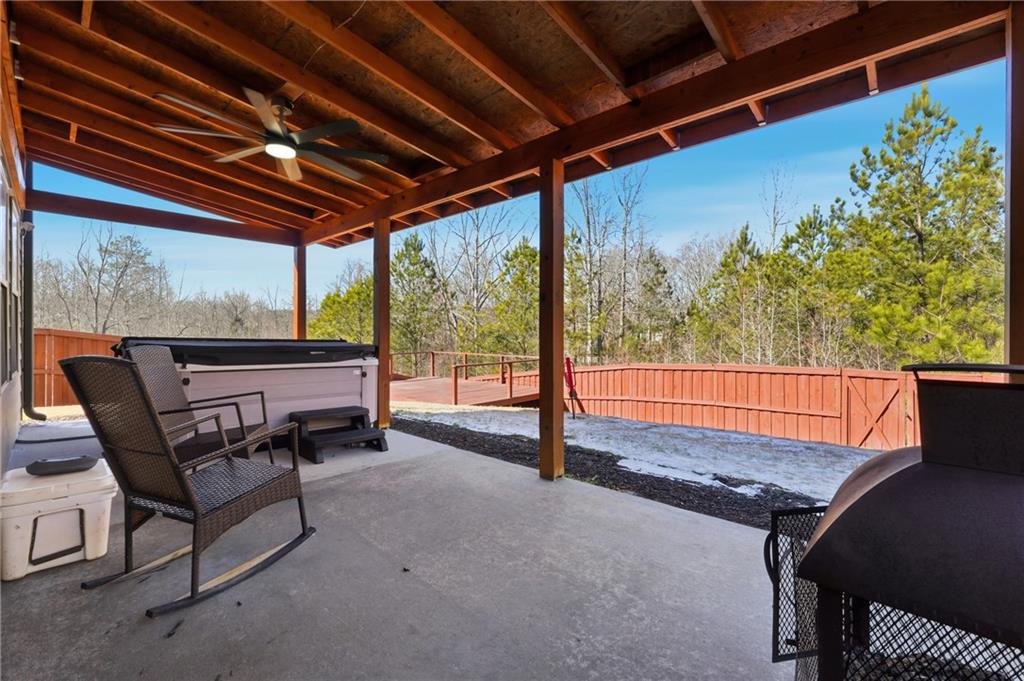 847 Wellford Avenue Jefferson, GA 30549 - Photo 32 of 33 a view of porch with a table and chairs