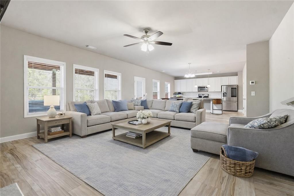 847 Wellford Avenue Jefferson, GA 30549 - Photo 5 of 33 a living room with furniture and a large window