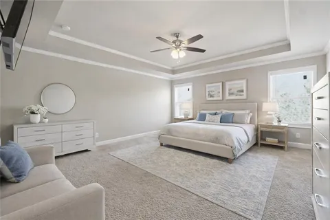 a bedroom with a large bed and closet