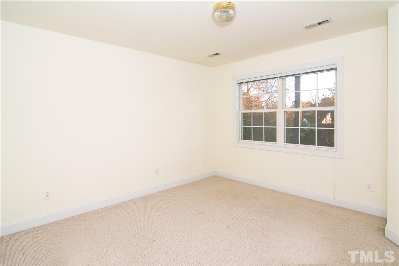4146 Standing Rock Way Raleigh, NC 27604 - Photo 11 of 18 an empty room with windows