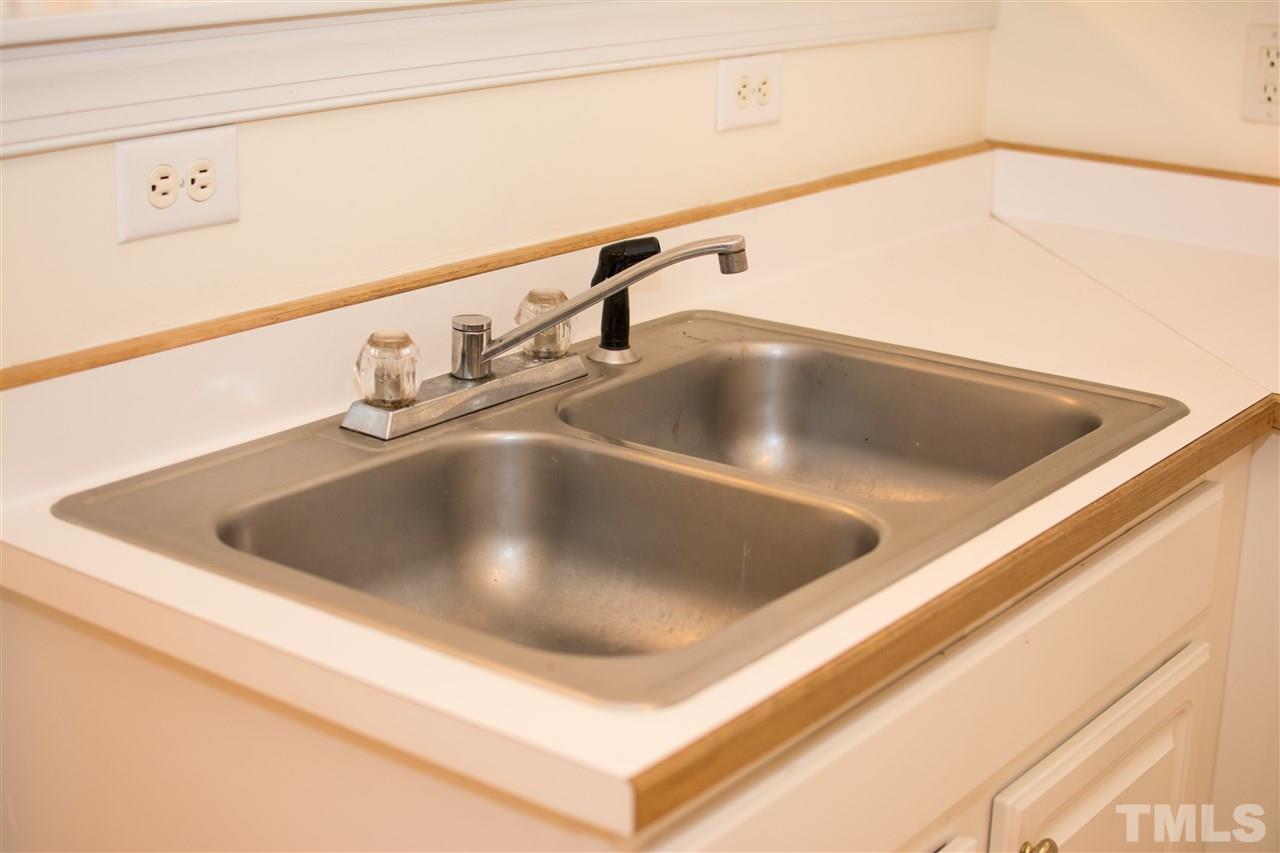 4146 Standing Rock Way Raleigh, NC 27604 - Photo 15 of 18 a close view of sink