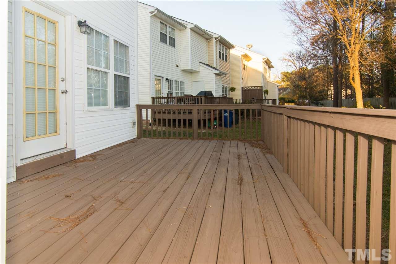 4146 Standing Rock Way Raleigh, NC 27604 - Photo 4 of 18 a balcony with wooden floor and furniture