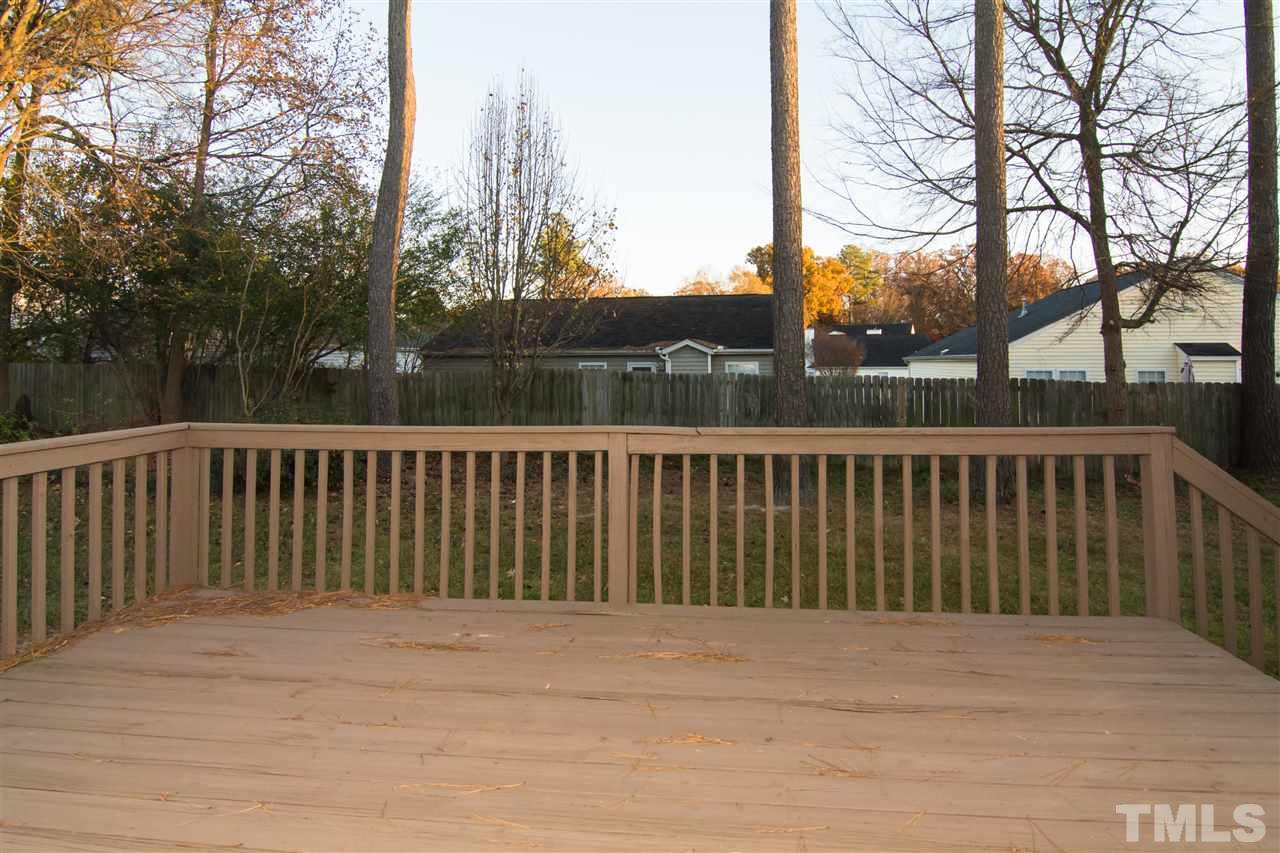 4146 Standing Rock Way Raleigh, NC 27604 - Photo 5 of 18 a view of balcony with trees