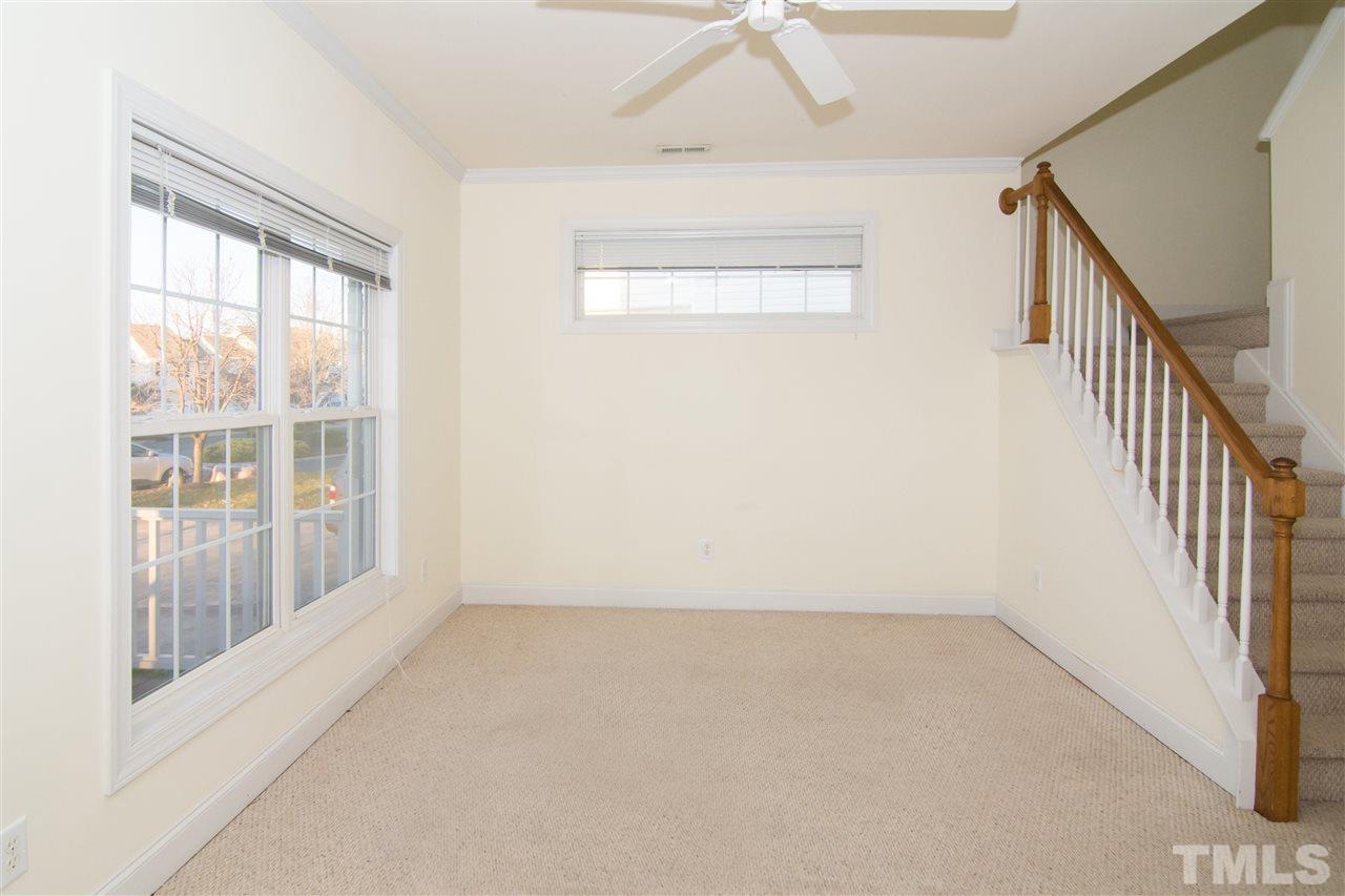 4146 Standing Rock Way Raleigh, NC 27604 - Photo 6 of 18 a view of an empty room with a window