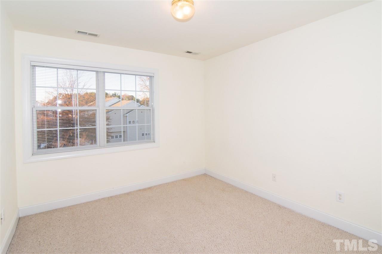 4146 Standing Rock Way Raleigh, NC 27604 - Photo 10 of 18 an empty room with windows