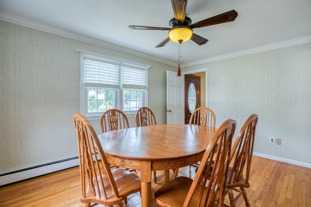 159 Fair Oak Road Springfield, MA 01128 - Photo 11 of 21 a view of a dining room with furniture and wooden floor