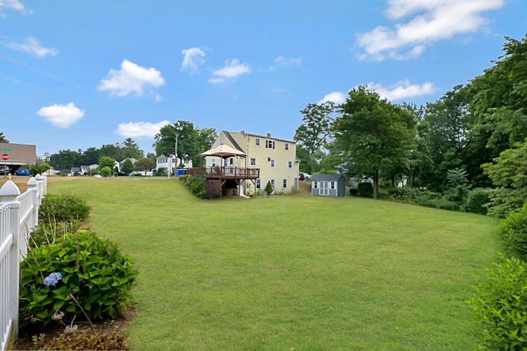 159 Fair Oak Road Springfield, MA 01128 - Photo 20 of 21 a front view of a house with garden