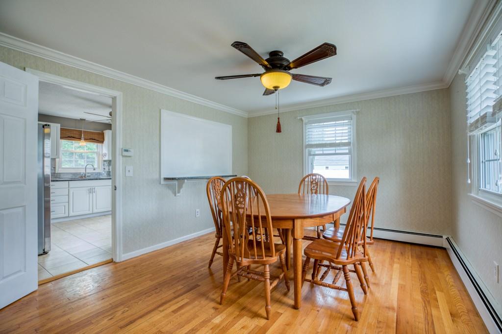 159 Fair Oak Road Springfield, MA 01128 - Photo 10 of 21 a view of a dining room with furniture and a window