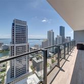 a view of balcony with wooden floor