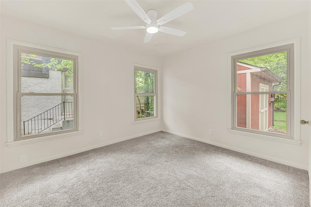 2418 Centerville Road Dallas, TX 75228 - Photo 19 of 22 3rd Bedroom looking to back yard