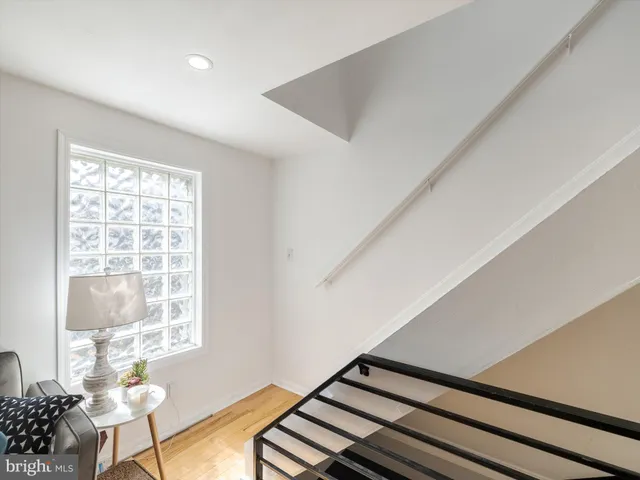 a bedroom with a bed and flat screen tv
