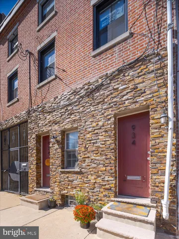 a workspace with furniture and wooden floor