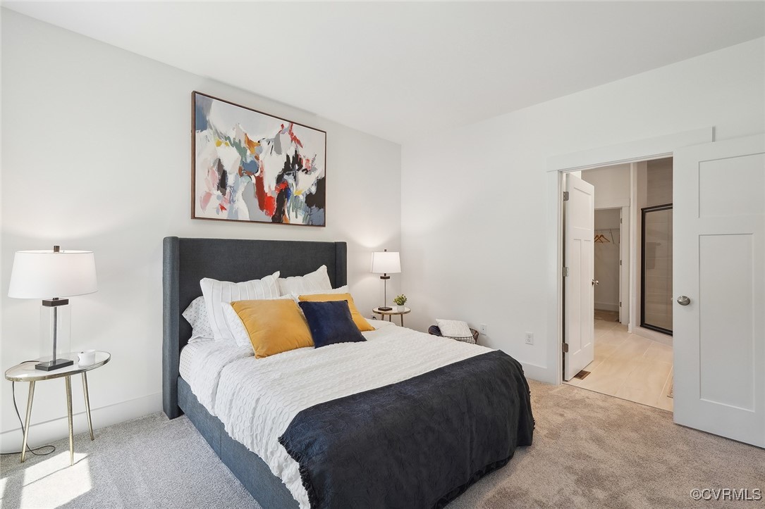 7600 Oak Grove Tree Drive Chesterfield, VA 23832 - Photo 14 of 17 a bedroom with a bed and a painting on the wall