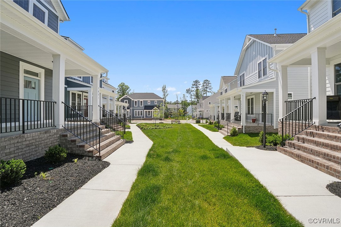 7600 Oak Grove Tree Drive Chesterfield, VA 23832 - Photo 6 of 17 a view of a house with a swimming pool