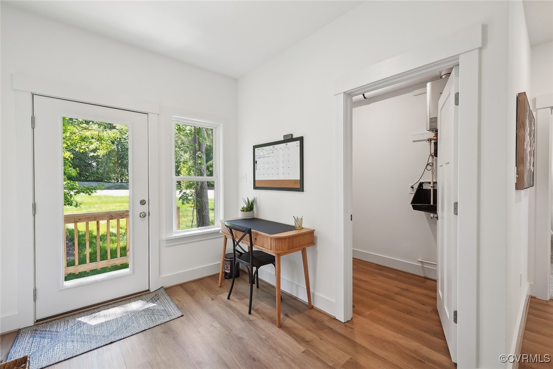 7600 Oak Grove Tree Drive Chesterfield, VA 23832 - Photo 9 of 17 a view of a room with furniture and windows