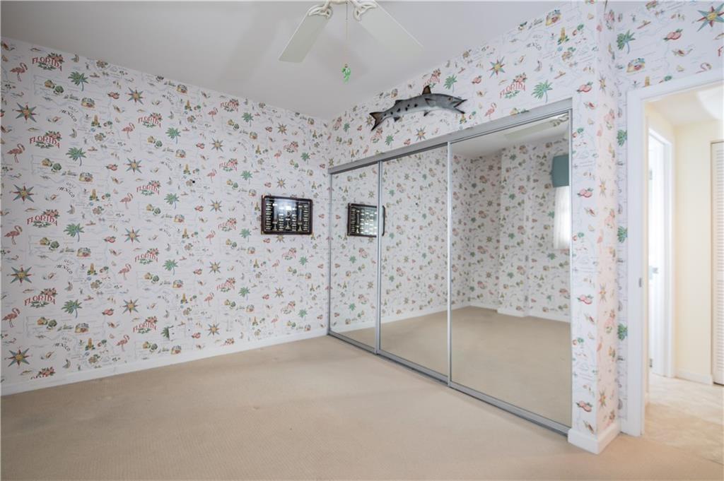 579 Northeast Plantation Road, Unit S407 Jensen Beach, FL 34957 - Photo 27 of 44 Locking Owner Closet