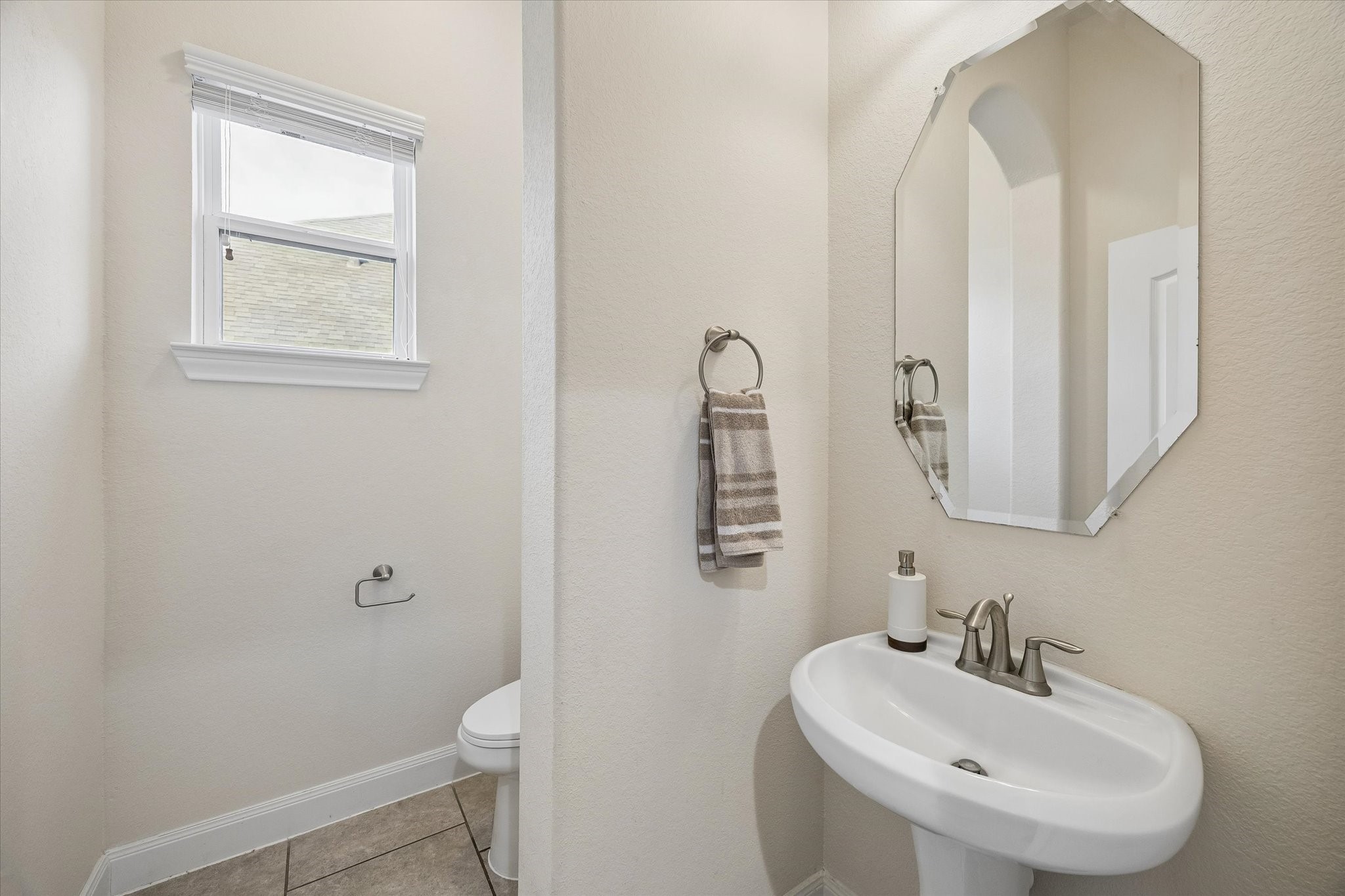 3306 Explorer Way Conroe, TX 77301 - Photo 16 of 35 Half bath located next to office and entrance hallway.
