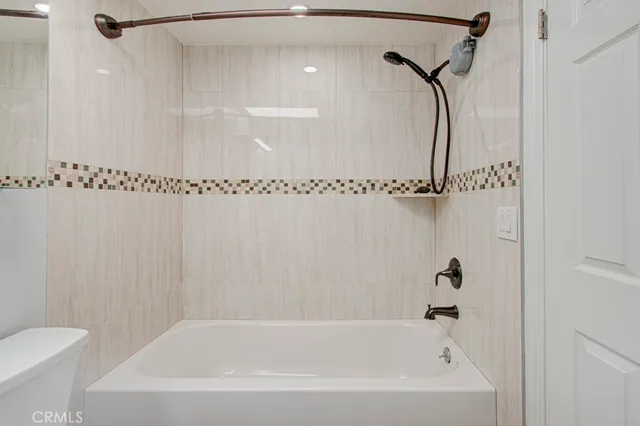 a close view of a bathtub in bathroom