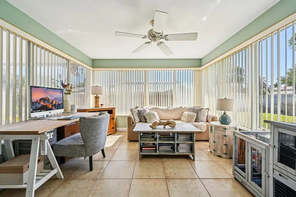 a kitchen with stainless steel appliances granite countertop a refrigerator and a stove