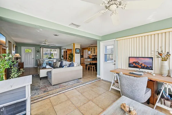a kitchen with stainless steel appliances granite countertop a stove and a refrigerator