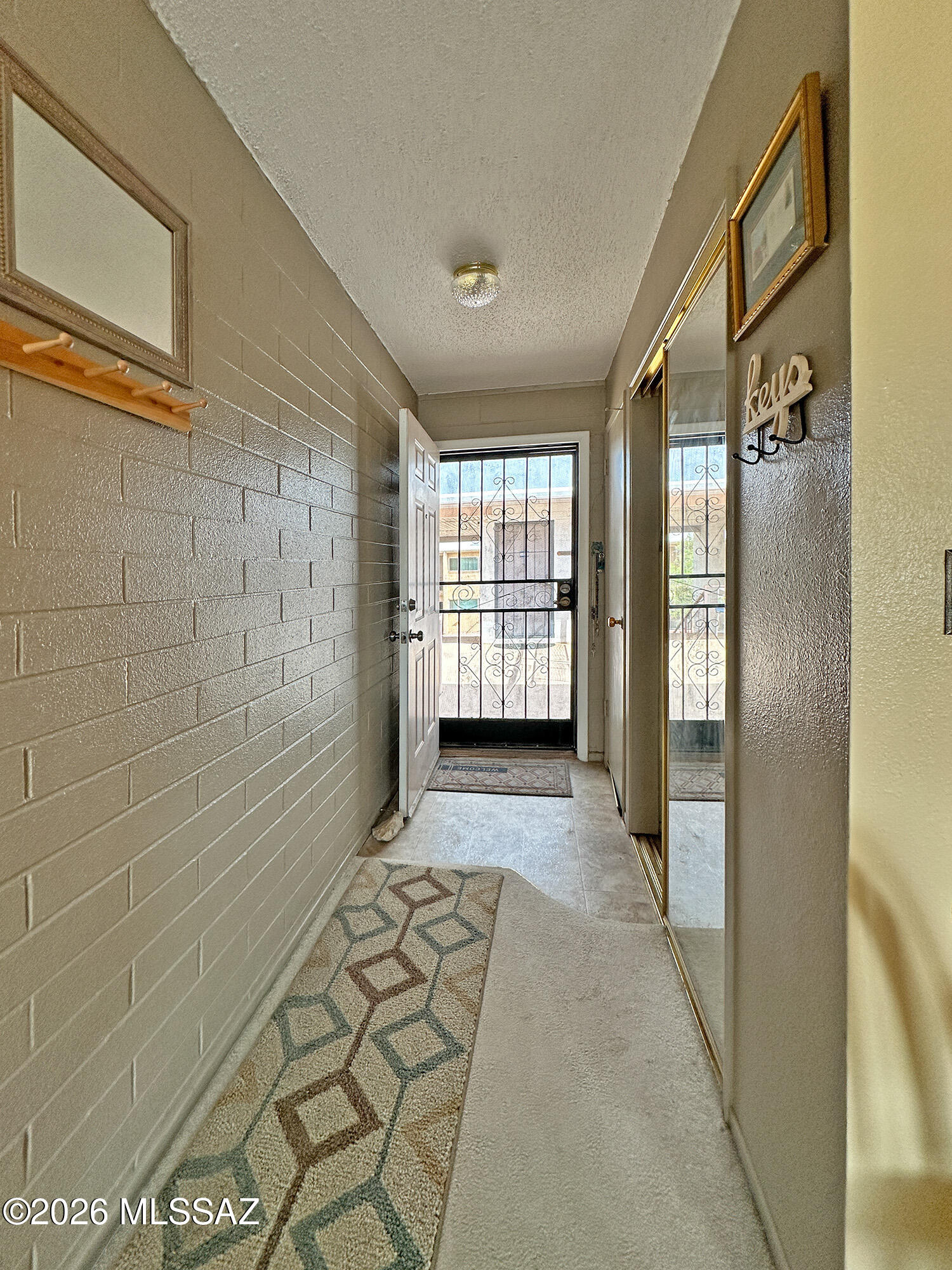 1755 South Jones Boulevard, Unit R 207 Tucson, AZ 85713 - Photo 13 of 31 Hall Entrance