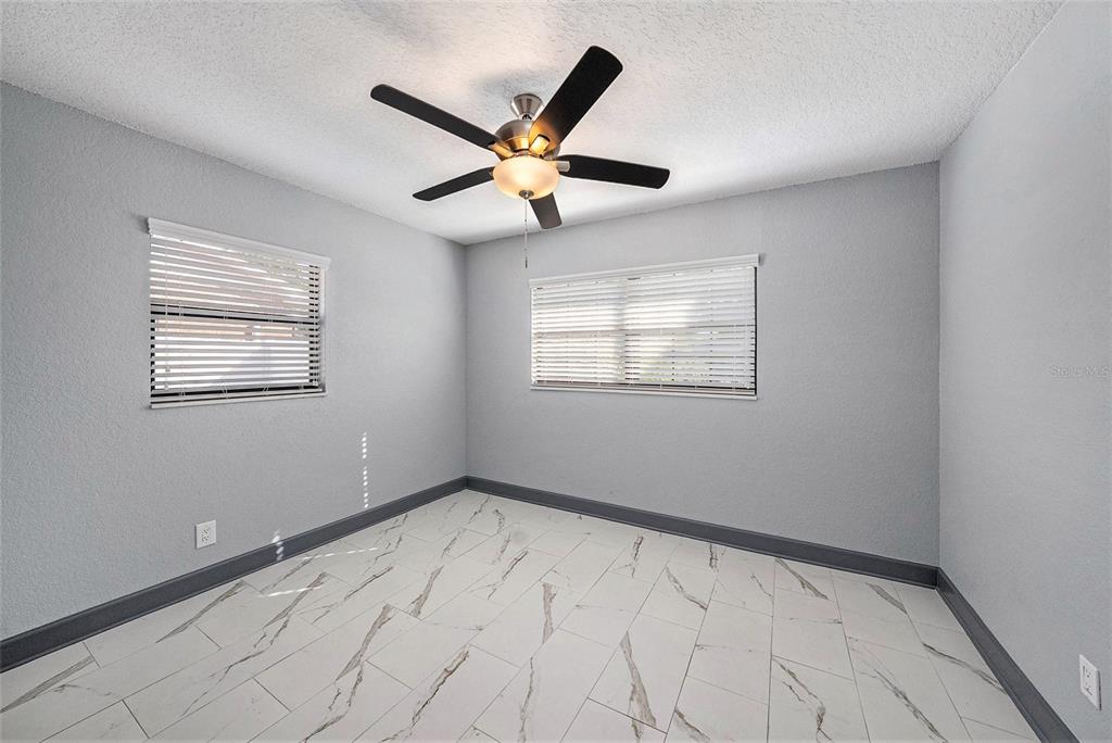 1713 West St Isabel Street Tampa, FL 33607 - Photo 13 of 25 a view of an empty room with a window