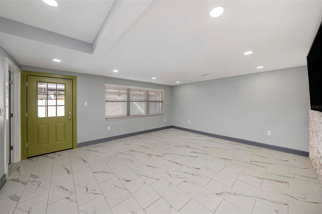 1713 West St Isabel Street Tampa, FL 33607 - Photo 15 of 25 an empty room with windows