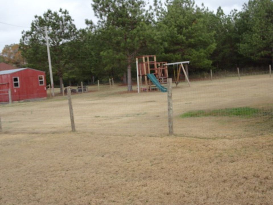 92 McLendon Road Fort Mitchell, AL 36856 - Photo 14 of 16 a house view with a outdoor space