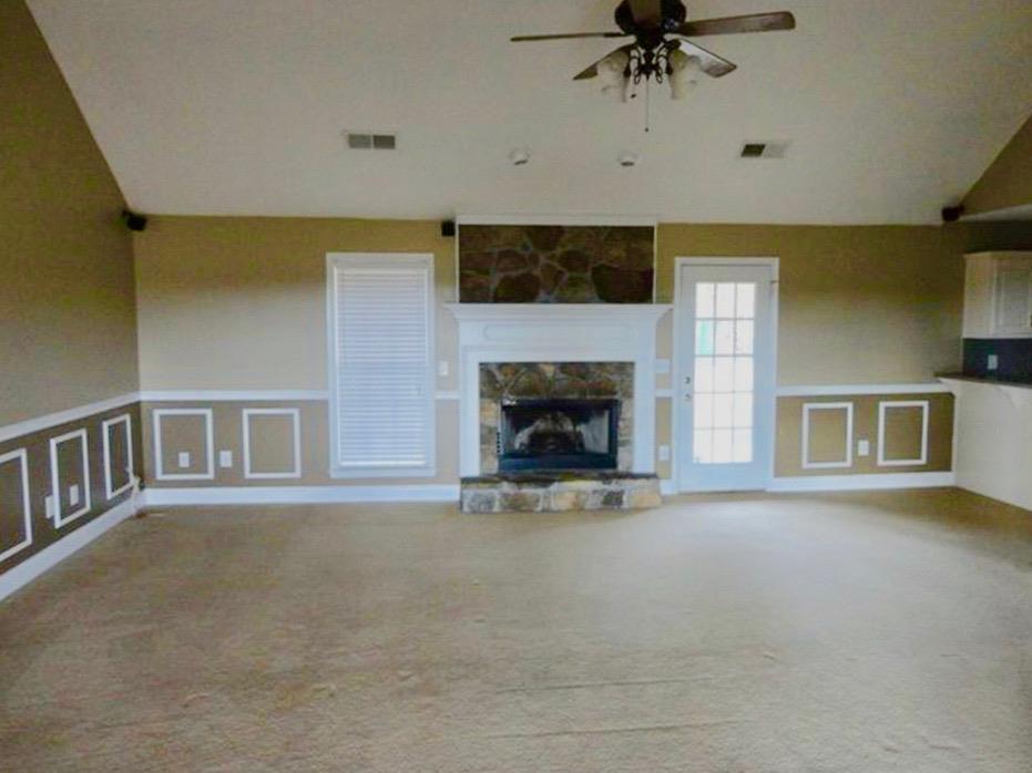 92 McLendon Road Fort Mitchell, AL 36856 - Photo 4 of 16 a view of an empty room with a fireplace